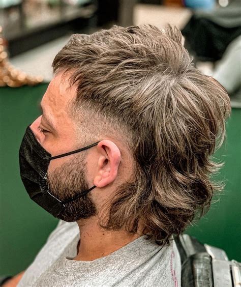 Blended and textured modern mullet with subtle fade